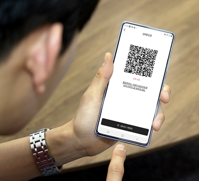 이동3사 '패스'앱으로 'QR 출입증'을 띄운 모습. SK텔레콤 제공